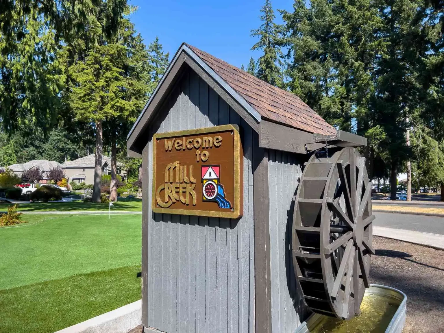 Mill Creek welcome sign close up at community entrance