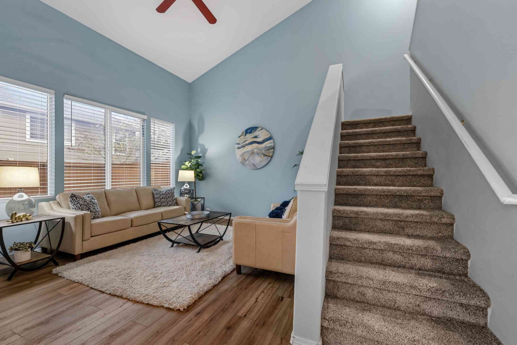 Open living area featuring stairs