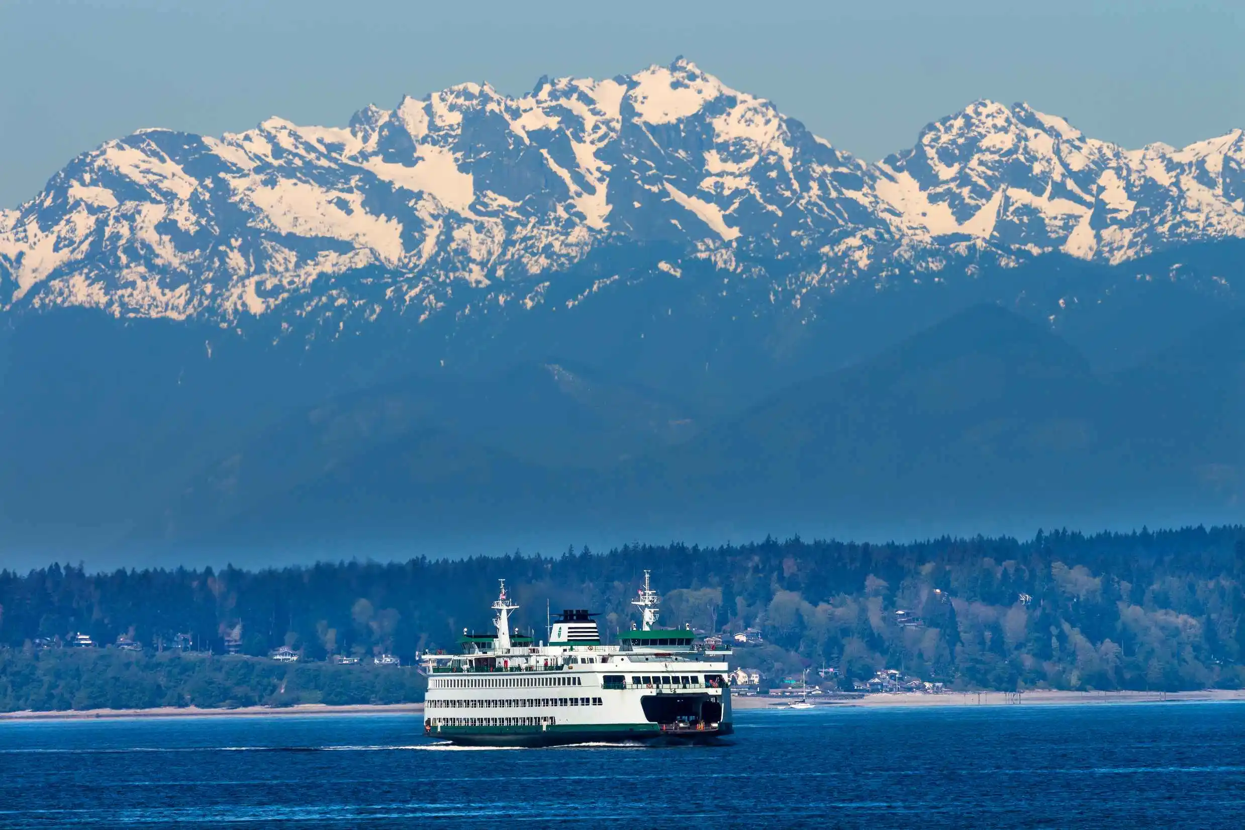 Washington State Ferries crossing Puget Sound with mountain view